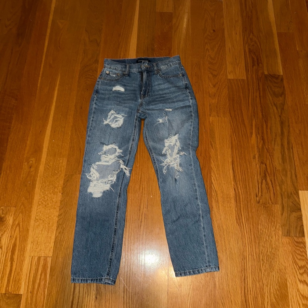 Distressed Blue Denim Jeans